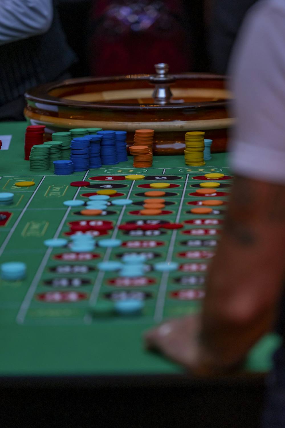 Roulette table with wheel and chips